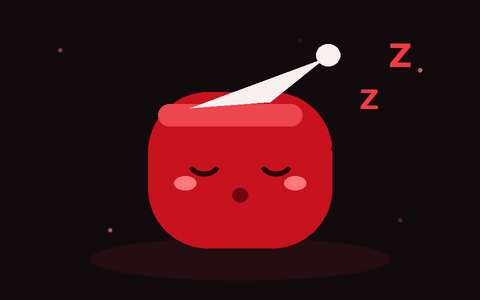 Een slapend rood blobje met een slaapmuts